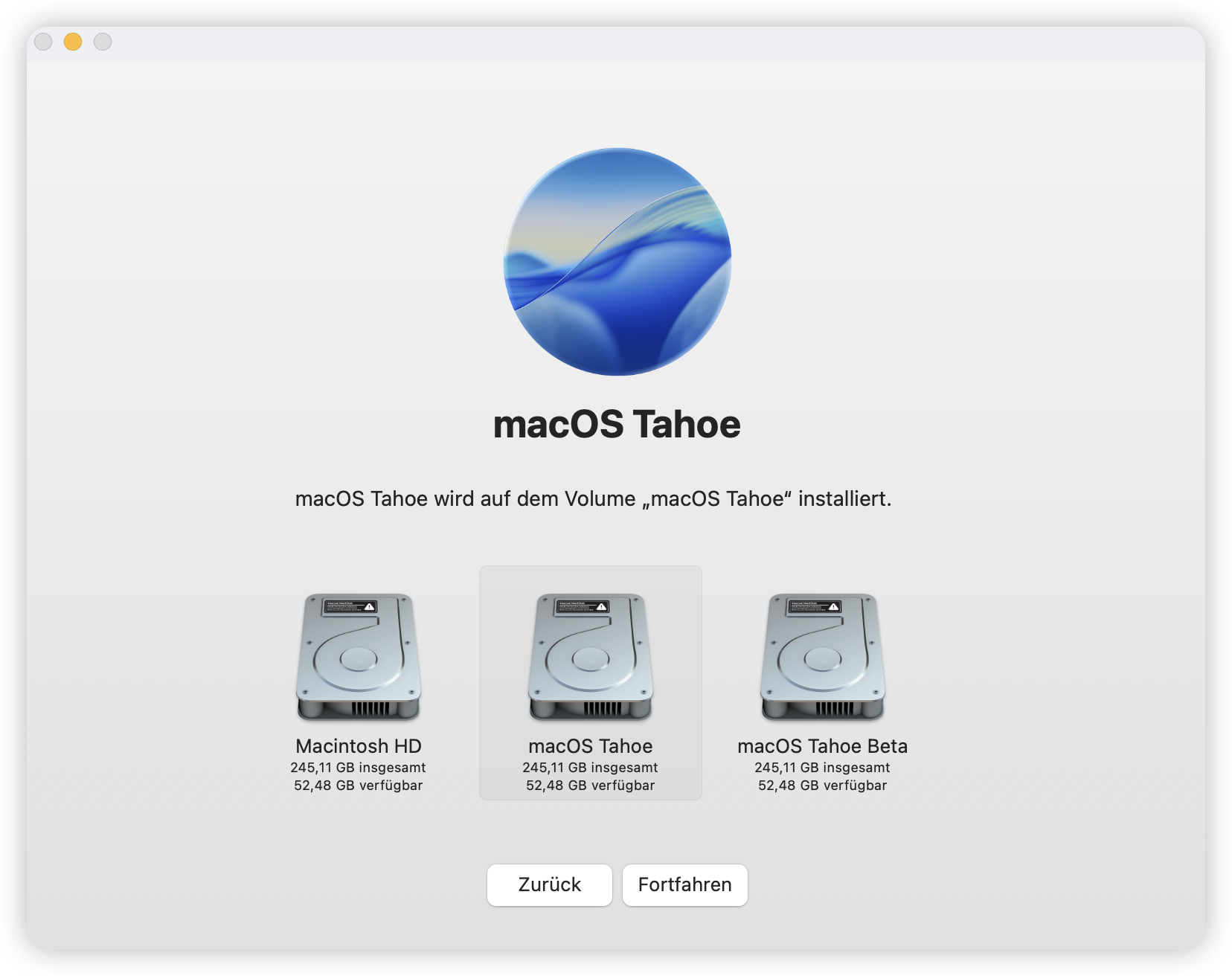 Wählen Sie eine Festplatte zur Installation von macOS Tahoe aus